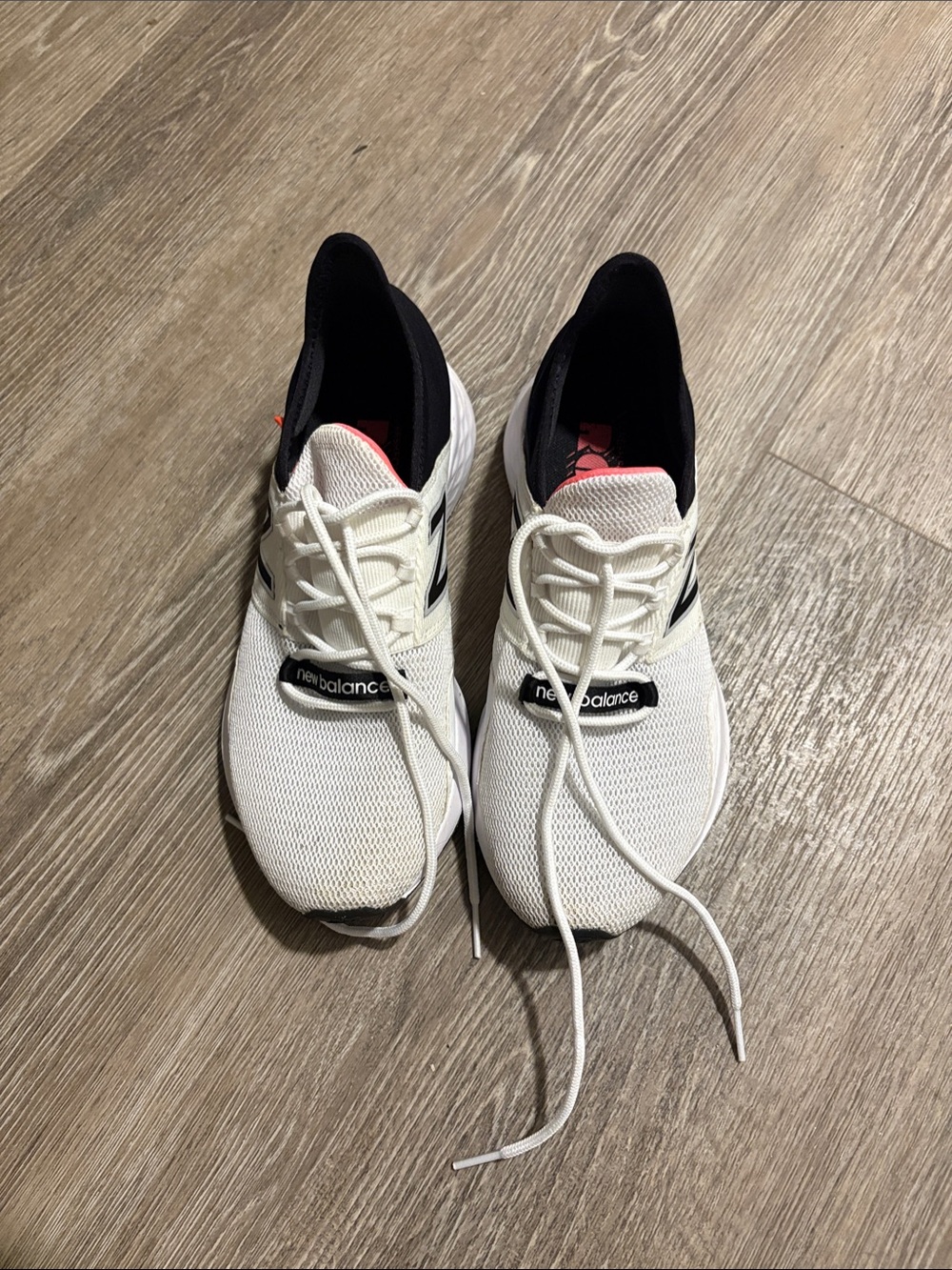 New Balance White Running Sneakers with Black Accents and Coral Tongue